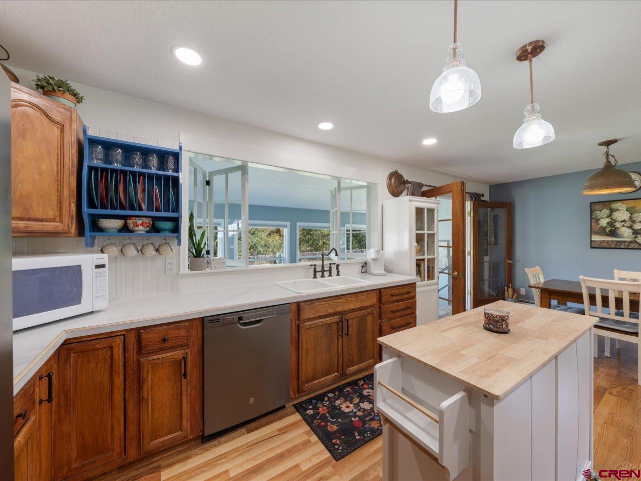 68184 Tumbleweed Road Montrose, CO 81403 - Photo 12 of 35 a kitchen with lots of counter space sink and appliances