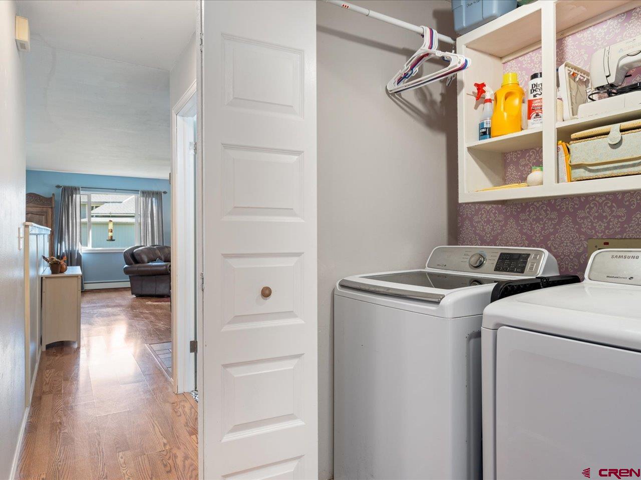 68184 Tumbleweed Road Montrose, CO 81403 - Photo 22 of 35 a view of hallway with washer and dryer