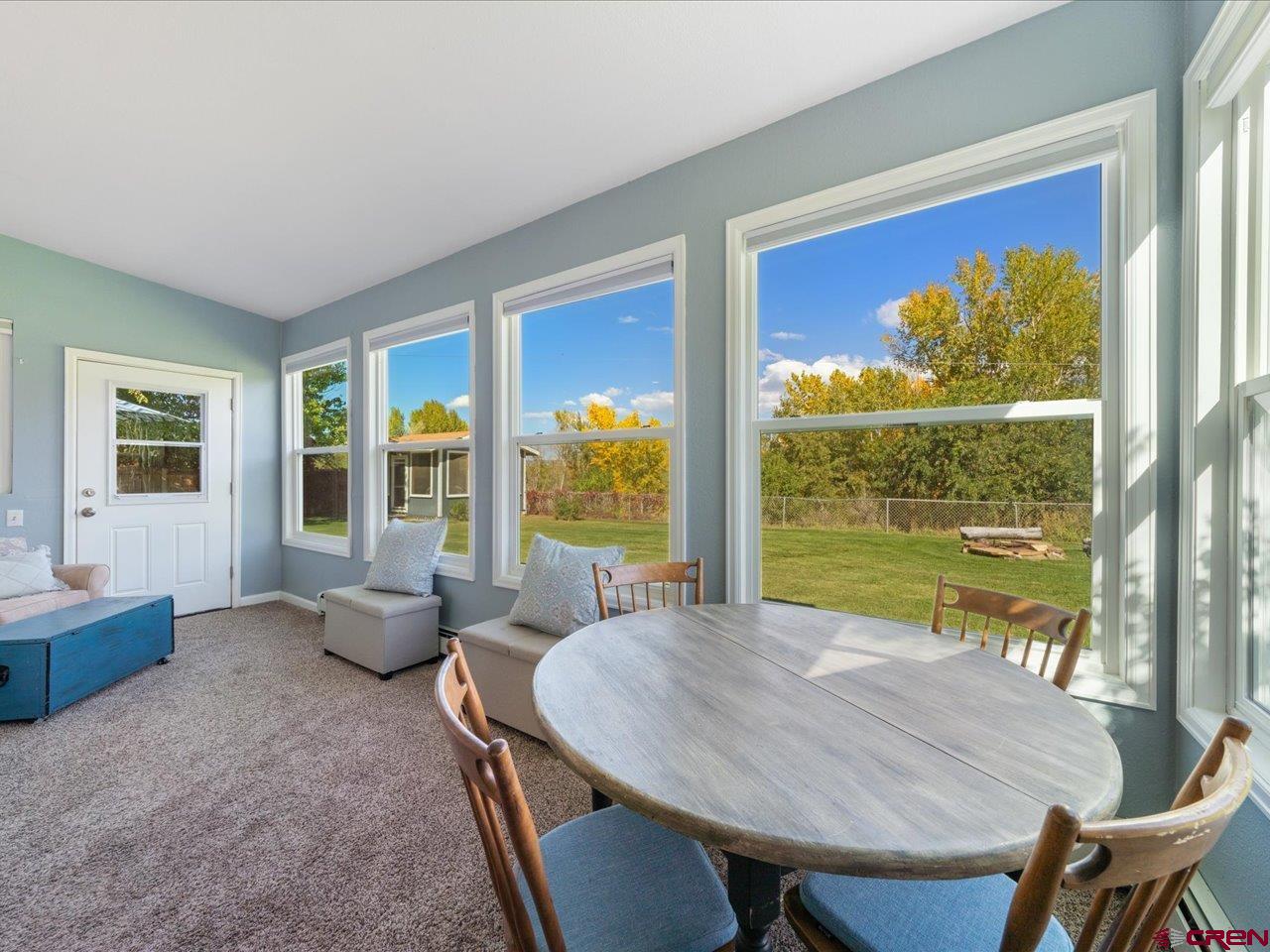 68184 Tumbleweed Road Montrose, CO 81403 - Photo 29 of 35 a view of a dining room with furniture window and outside view