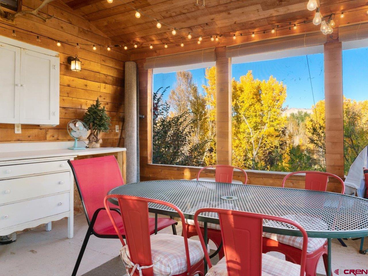 68184 Tumbleweed Road Montrose, CO 81403 - Photo 33 of 35 a view of a dining room with furniture window and outside view