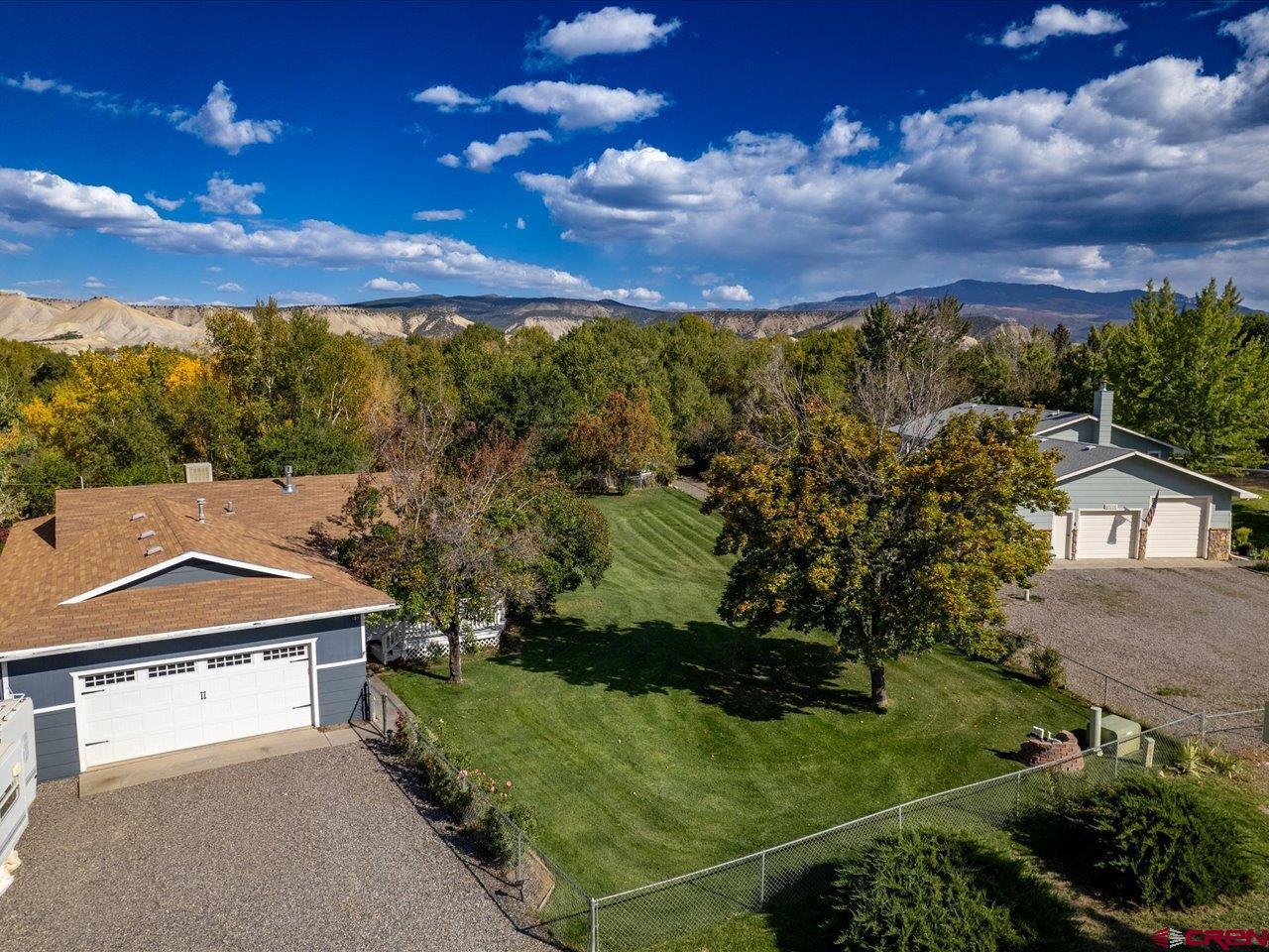 68184 Tumbleweed Road Montrose, CO 81403 - Photo 4 of 35 an aerial view of a house with a yard