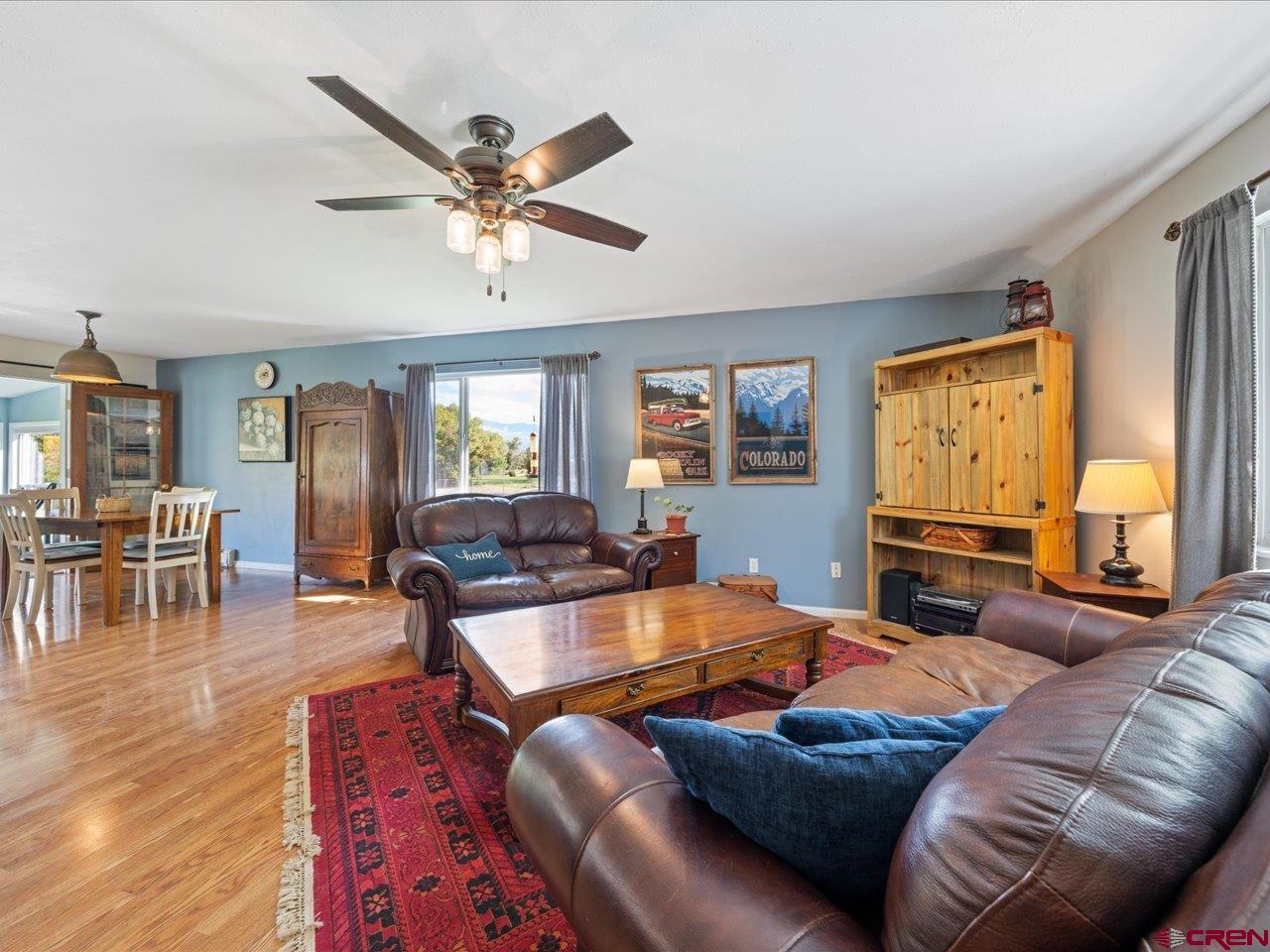 68184 Tumbleweed Road Montrose, CO 81403 - Photo 9 of 35 a living room with furniture and wooden floor