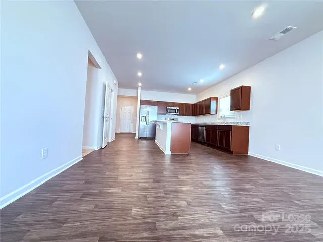 a view of kitchen and stainless steel appliances