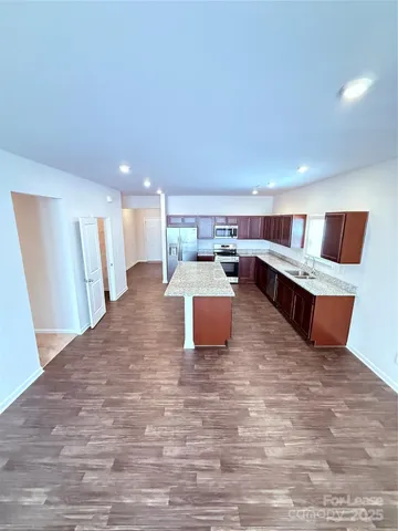 a large room with wooden floor