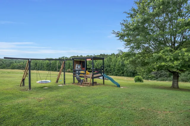 a view of a park with swings