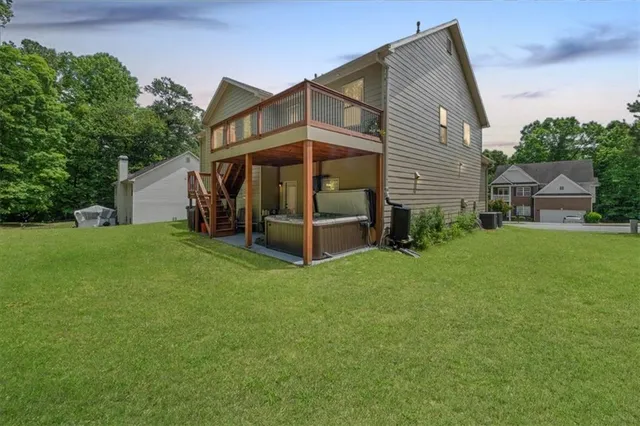 an aerial view of residential house with outdoor space