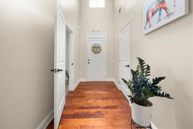 a view of a hallway with flower pot