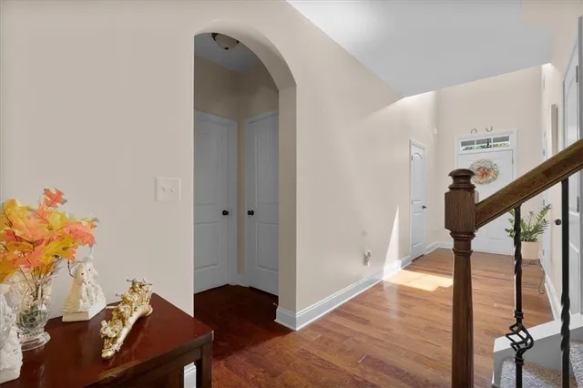 a view of entryway with wooden floor