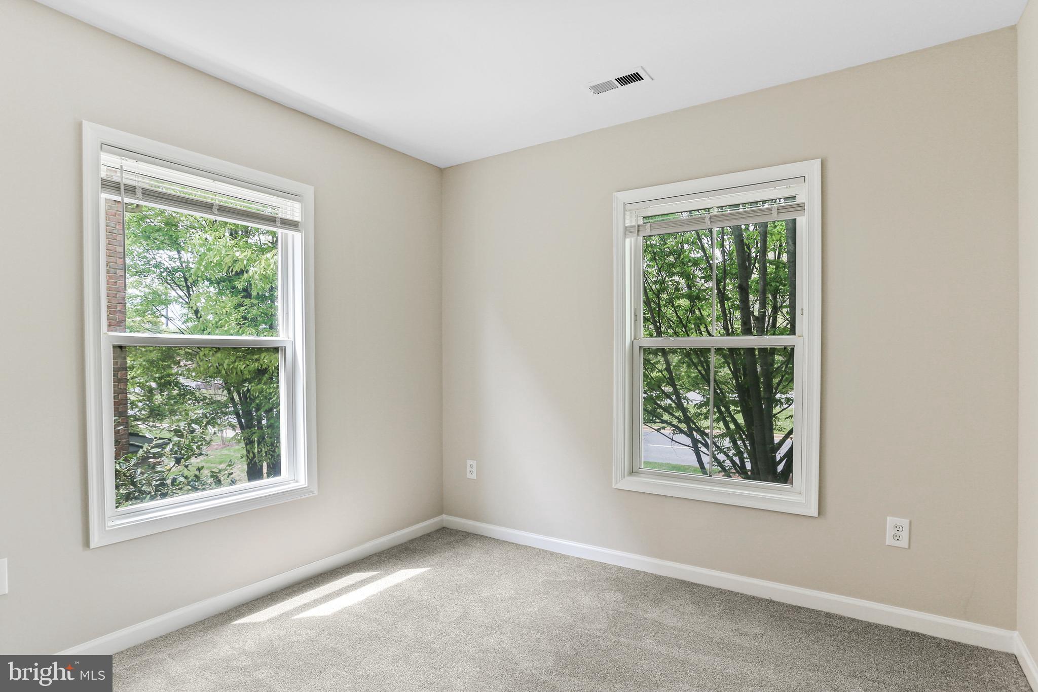 10232 Rutland Round Road, Unit 24 Columbia, MD 21044 - Photo 21 of 31 an empty room with a window