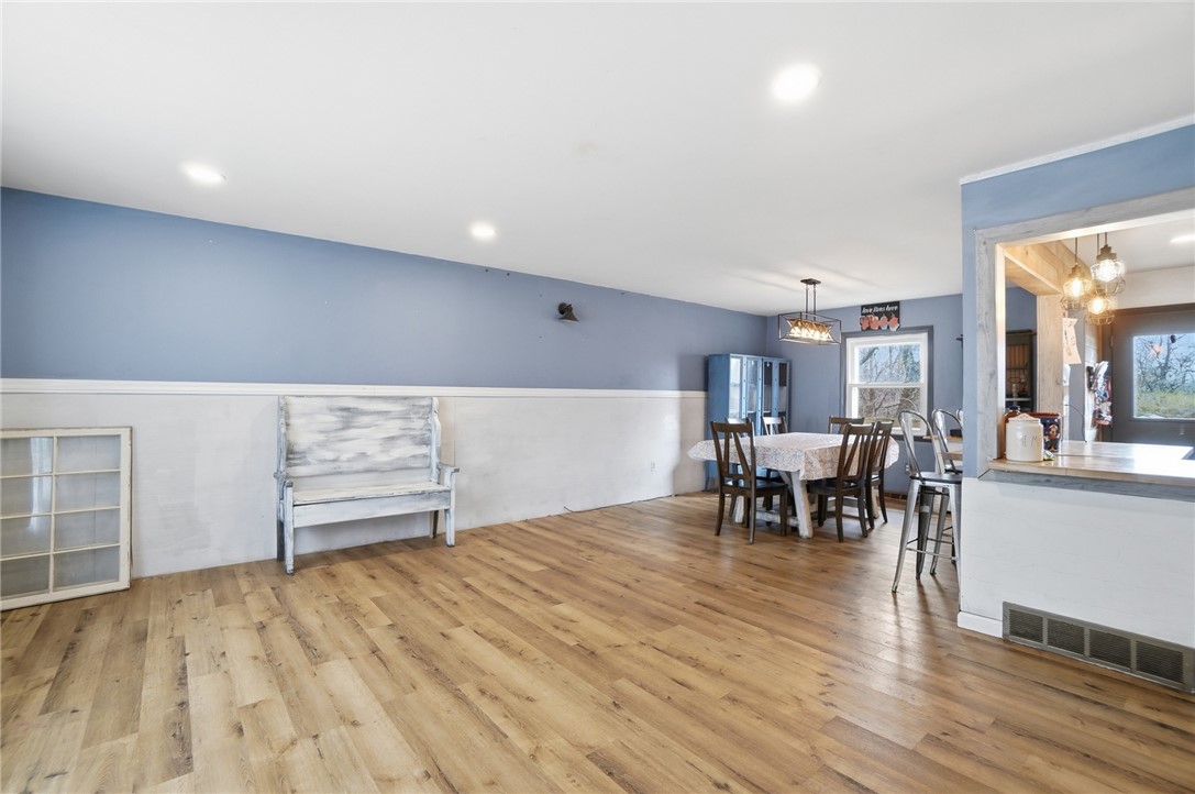 290 Ginghamsburg Road Tipp City, OH 45371 - Photo 10 of 49 This airy space features natural light and durable flooring, perfect for everyday living and entertaining.