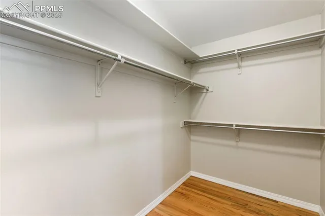 a view of a room with racks on the wall