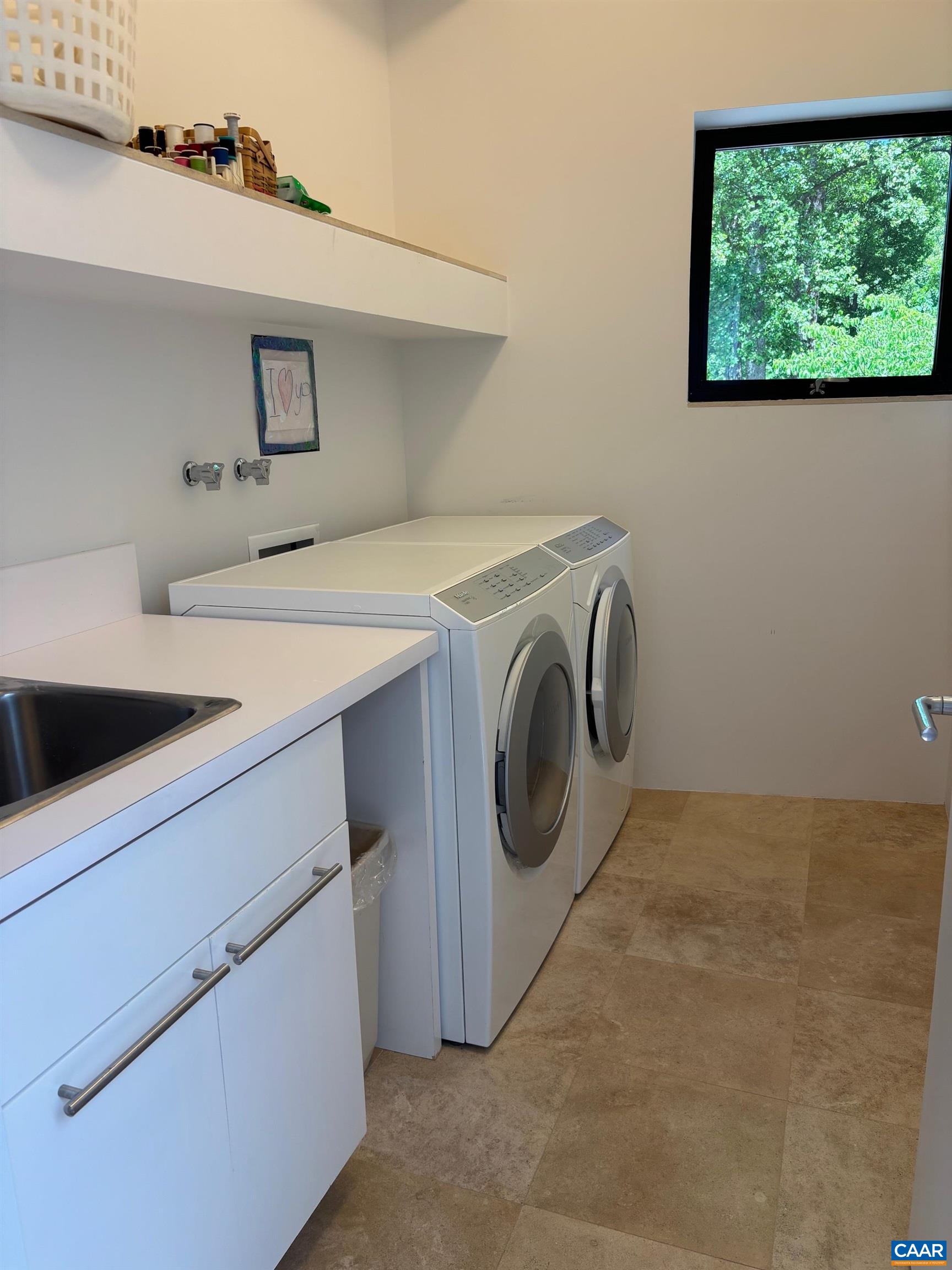 Undisclosed Address Charlottesville, VA 22903 - Photo 16 of 32 a utility room with dryer and washer