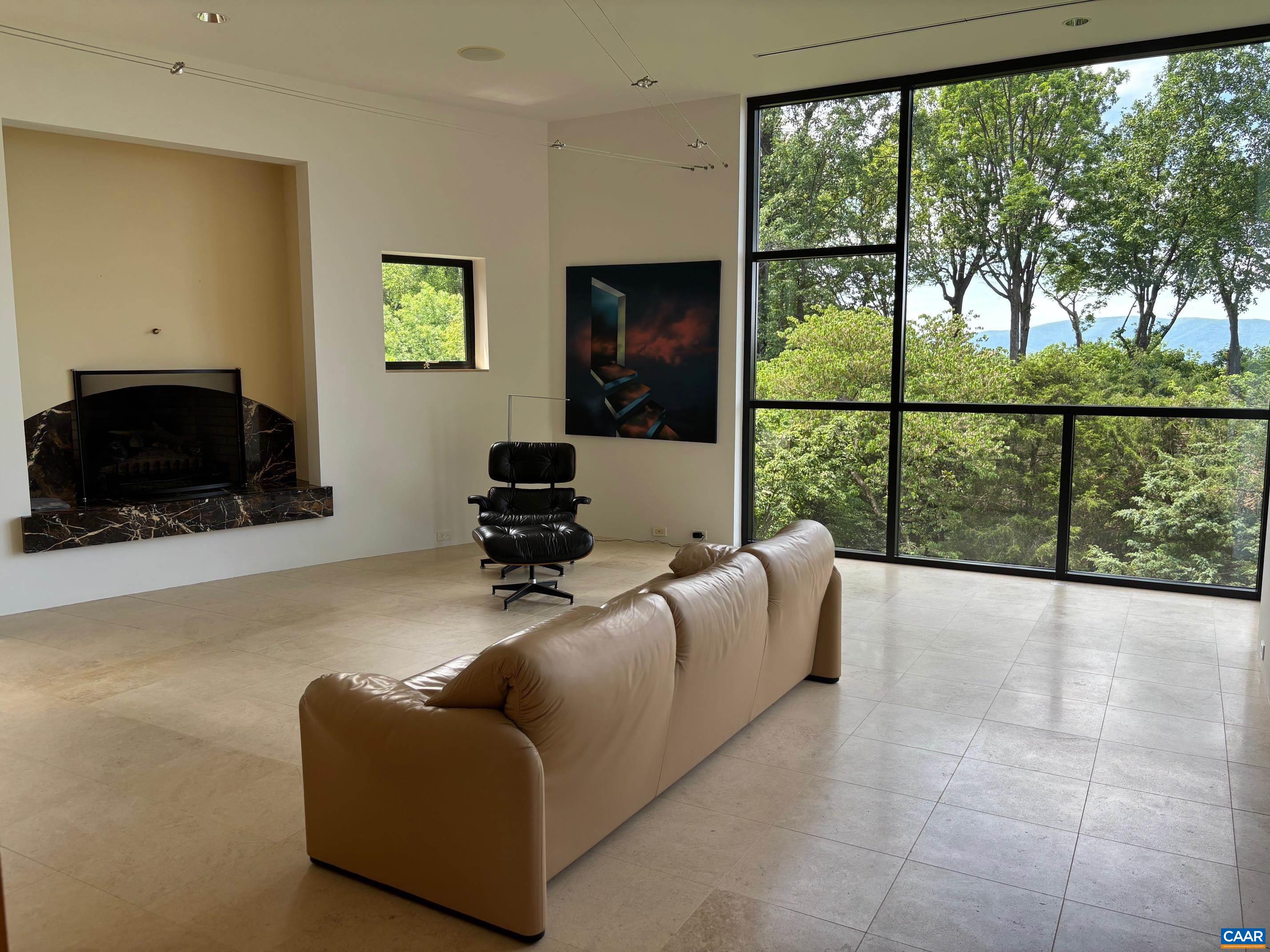 Undisclosed Address Charlottesville, VA 22903 - Photo 18 of 32 a living room with furniture tv and a large window