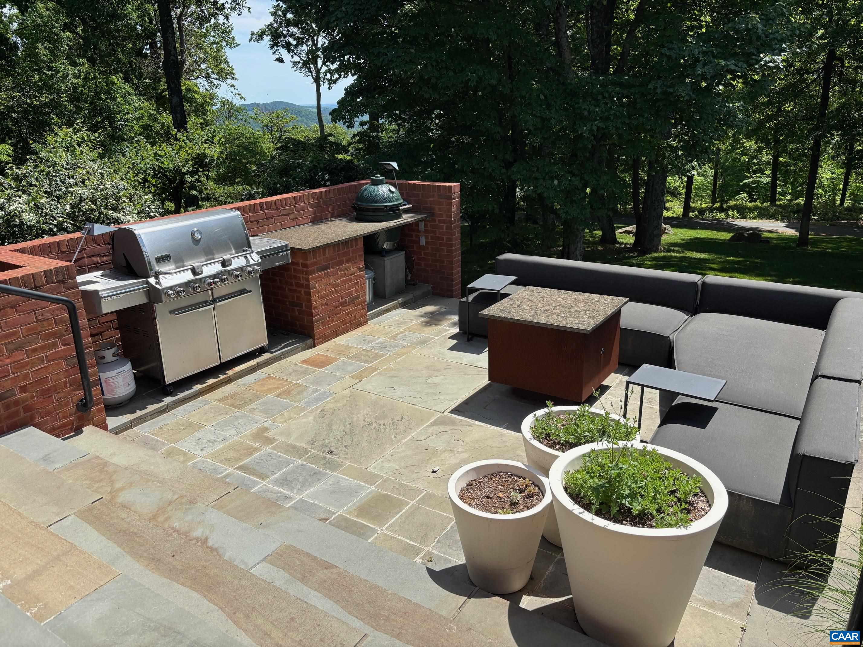 Undisclosed Address Charlottesville, VA 22903 - Photo 25 of 32 a view of a chair and tables back yard of the house
