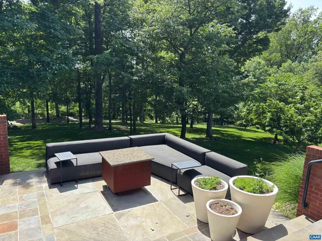 a view of a yard with an outdoor space