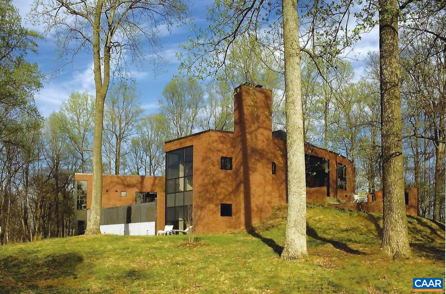 Undisclosed Address Charlottesville, VA 22903 - Photo 29 of 32 a front view of a house with a yard