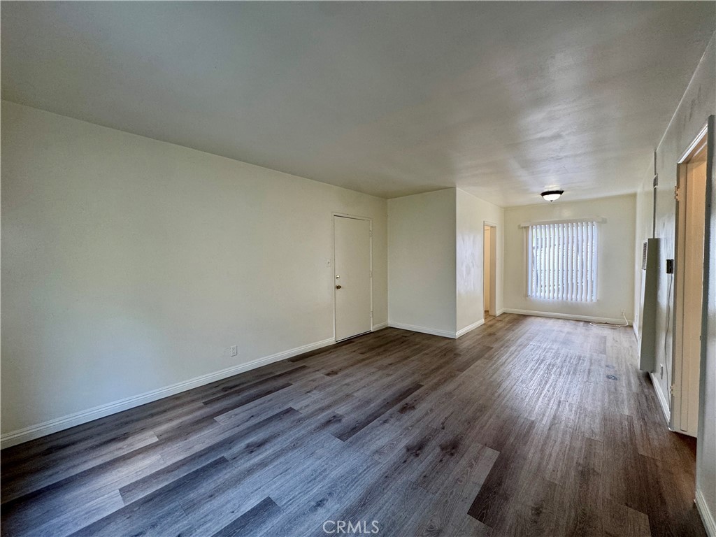 516 East Lomita Avenue, Unit 3 Glendale, CA 91205 - Photo 2 of 9 a view of a room with wooden floor and a window