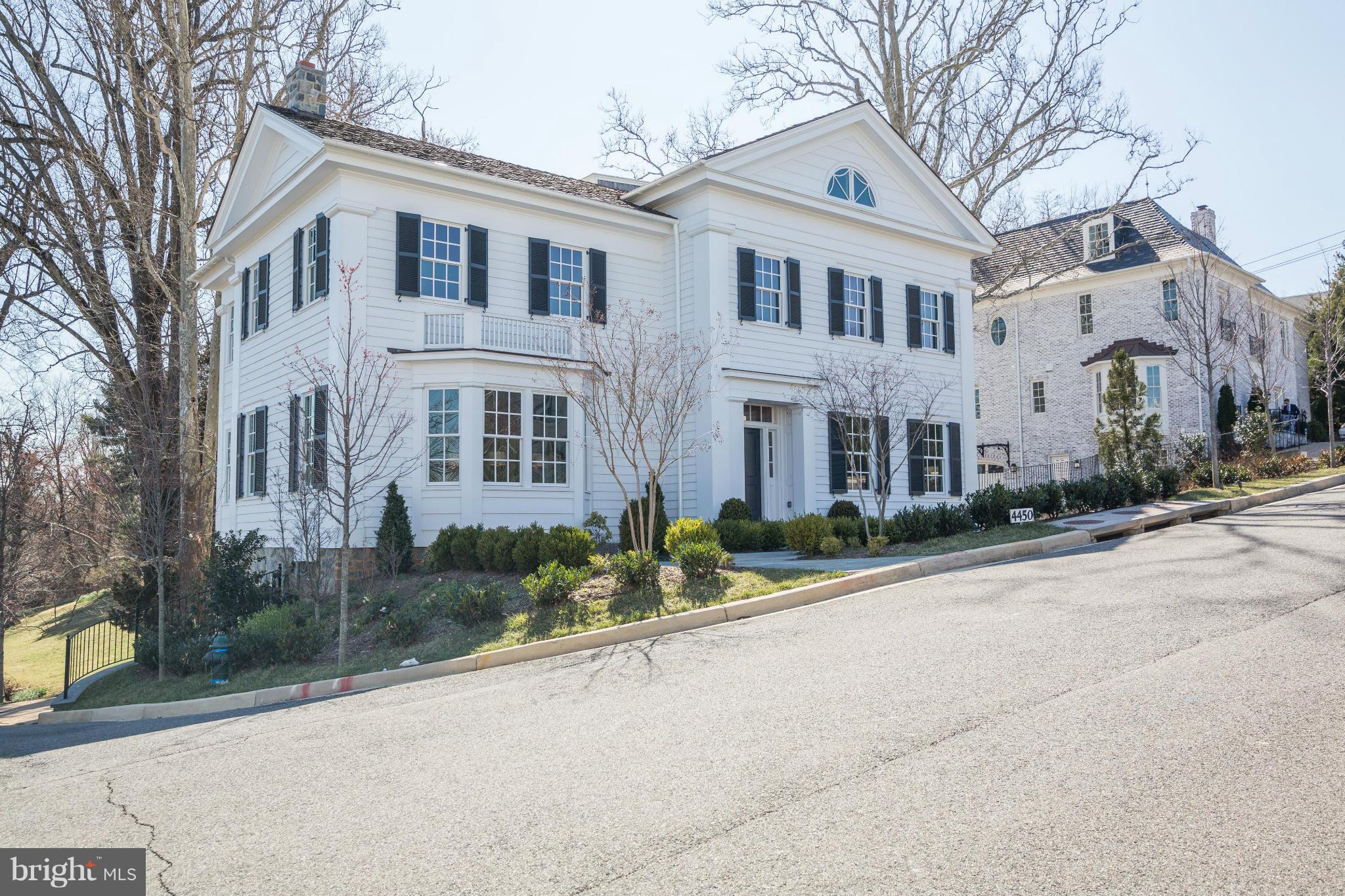 4450 Deerfield Road Washington, DC 20007 - Photo 1 of 28 a front view of a building with a garden and plants