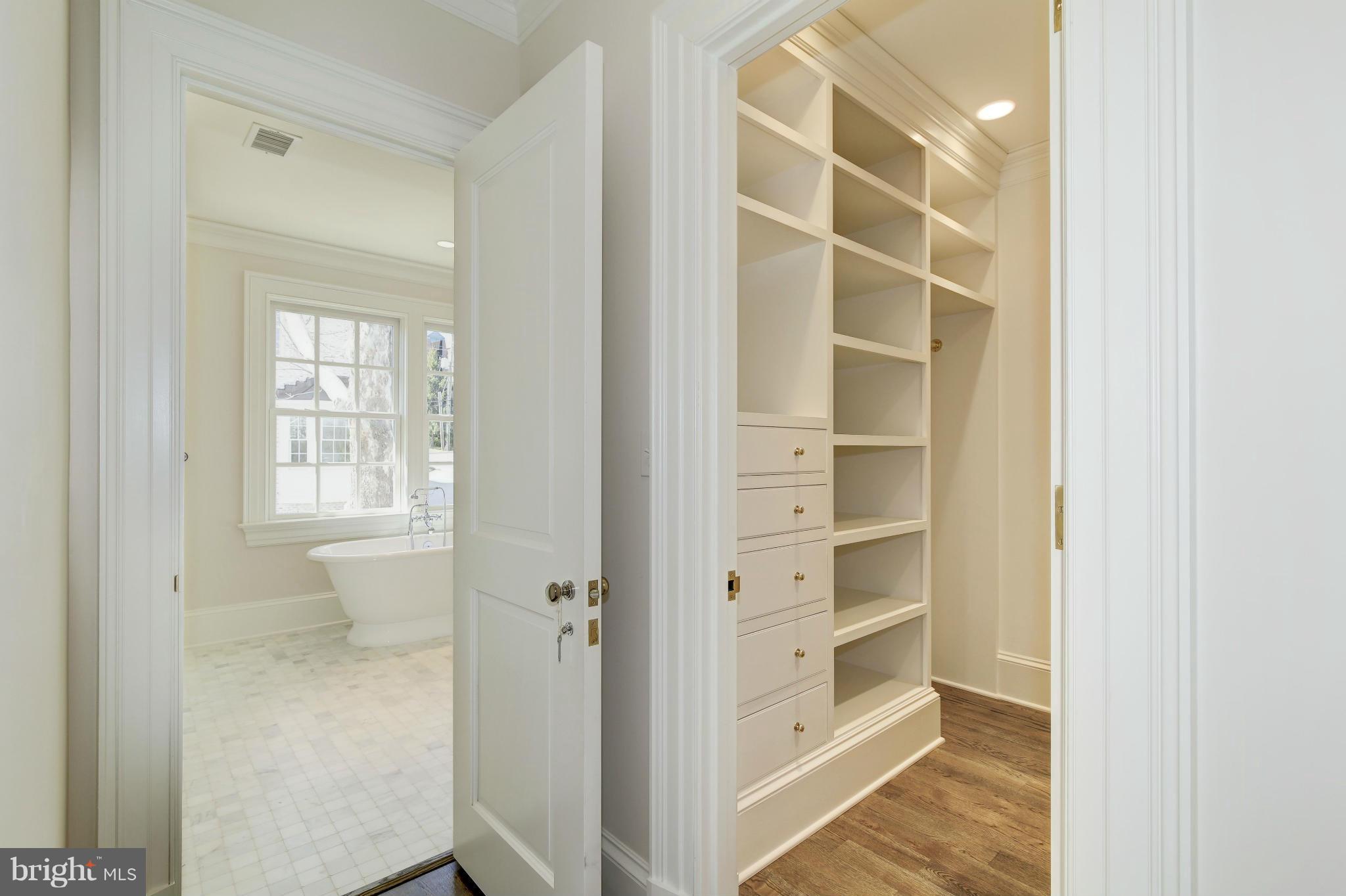 4450 Deerfield Road Washington, DC 20007 - Photo 12 of 28 a view of a hallway with closet and window