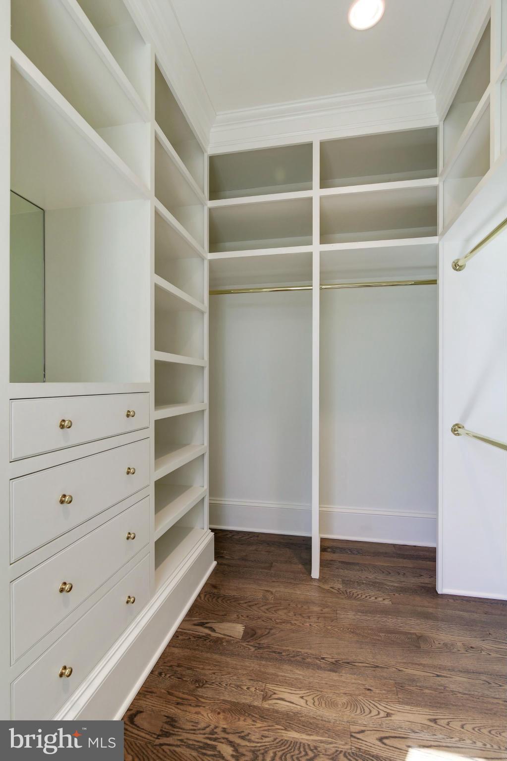 4450 Deerfield Road Washington, DC 20007 - Photo 13 of 28 a view of an empty walk in closet