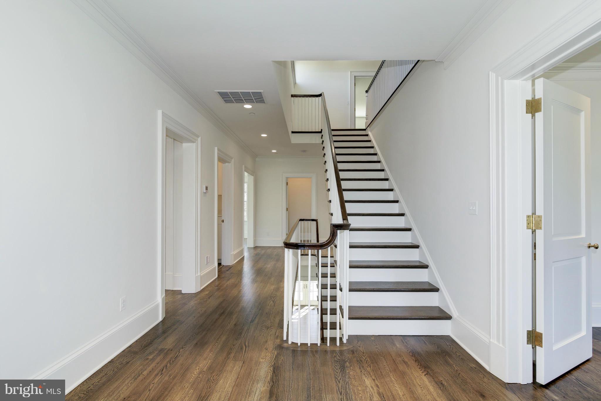 4450 Deerfield Road Washington, DC 20007 - Photo 18 of 28 a view of entryway with wooden floor