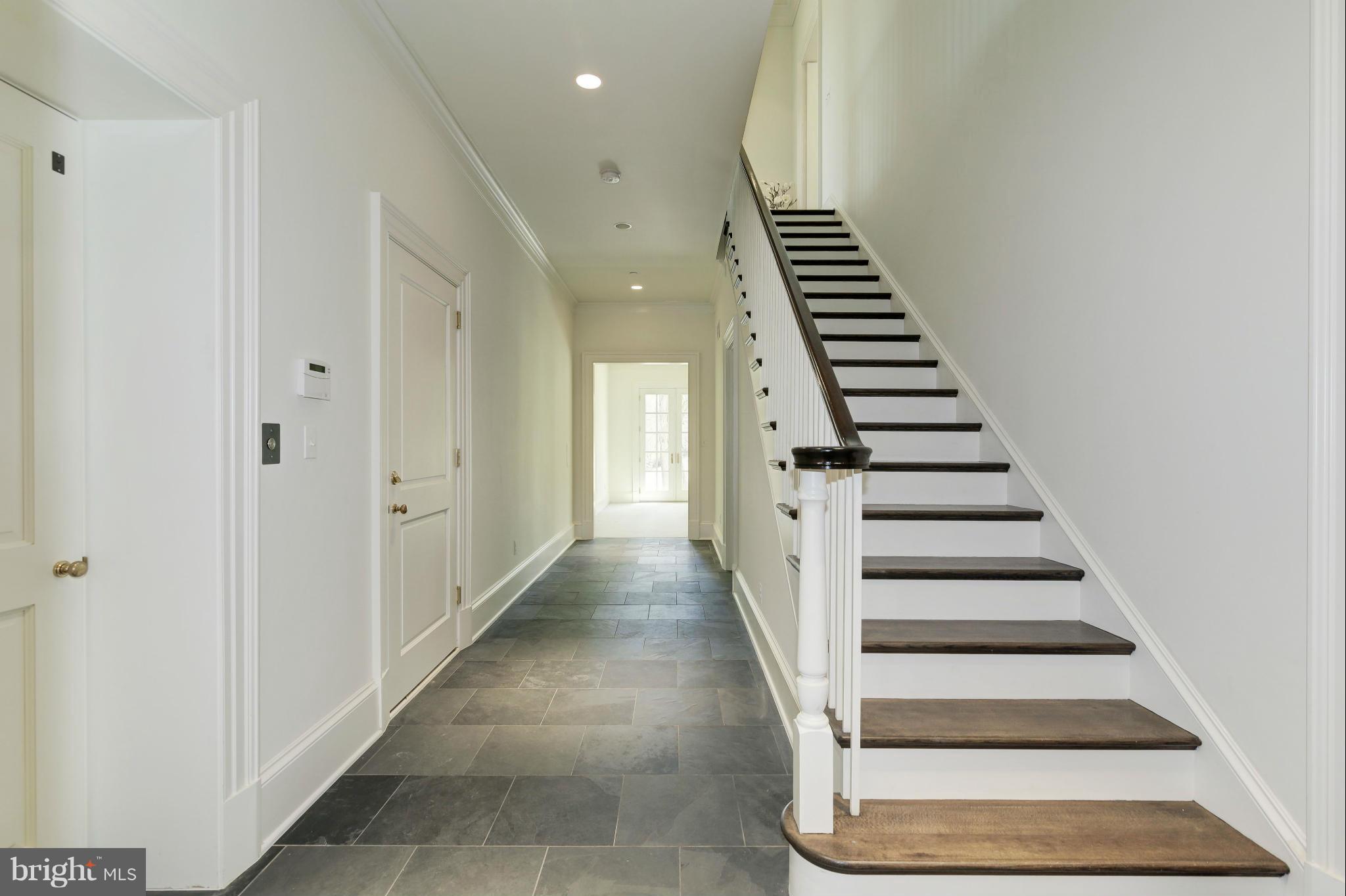 4450 Deerfield Road Washington, DC 20007 - Photo 23 of 28 a view of entryway and hall with wooden floor