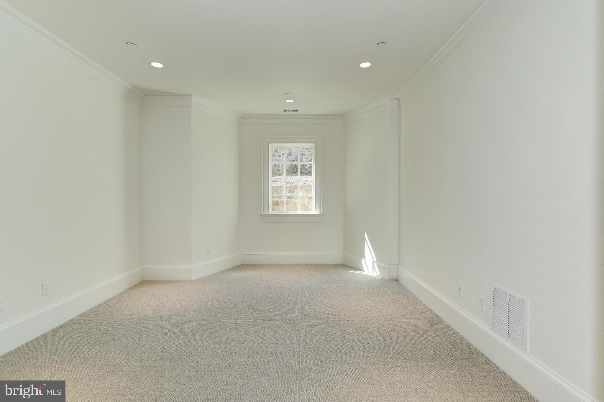 4450 Deerfield Road Washington, DC 20007 - Photo 25 of 28 an empty room with windows