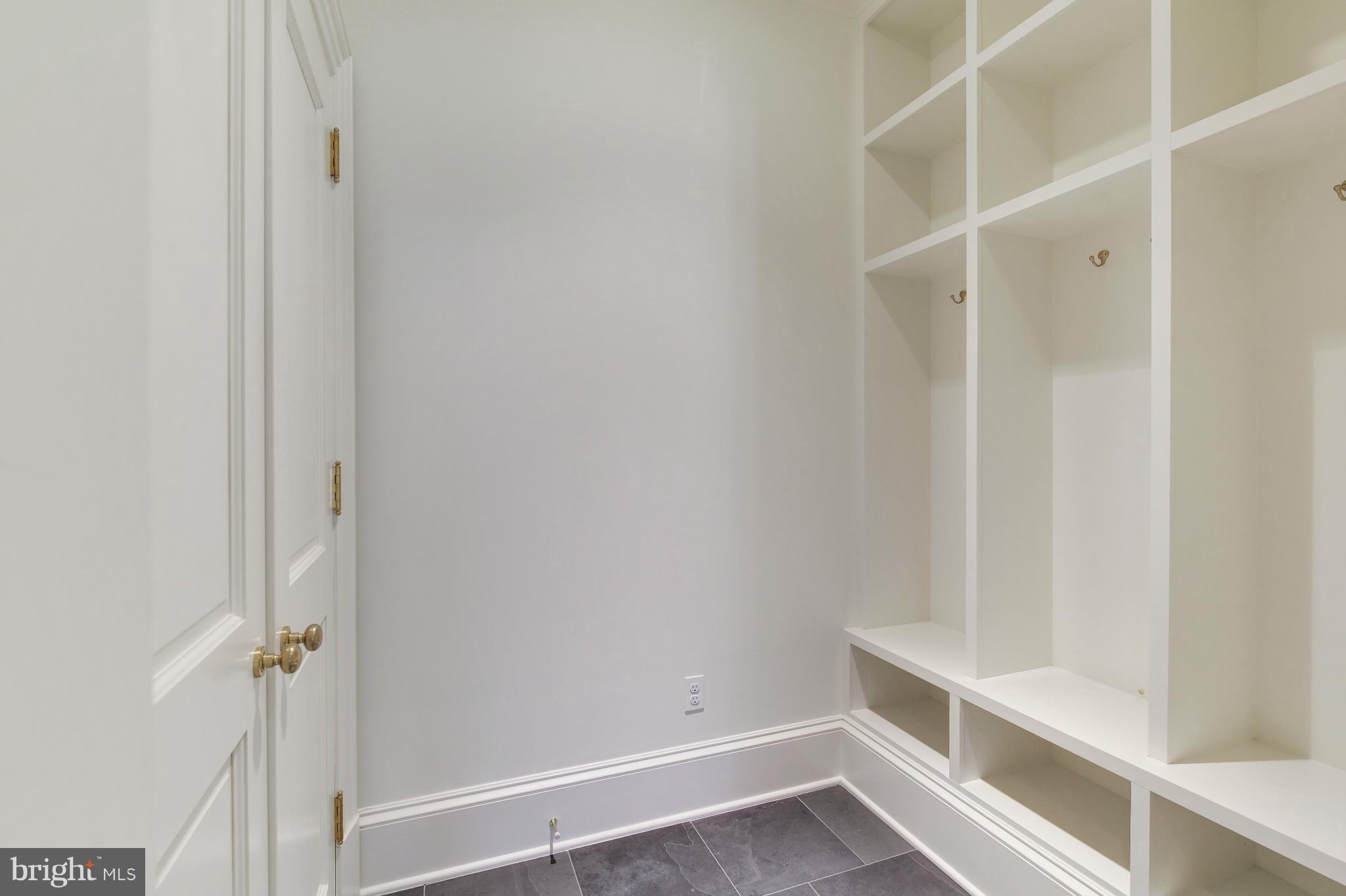 4450 Deerfield Road Washington, DC 20007 - Photo 26 of 28 a view of an empty walk in closet