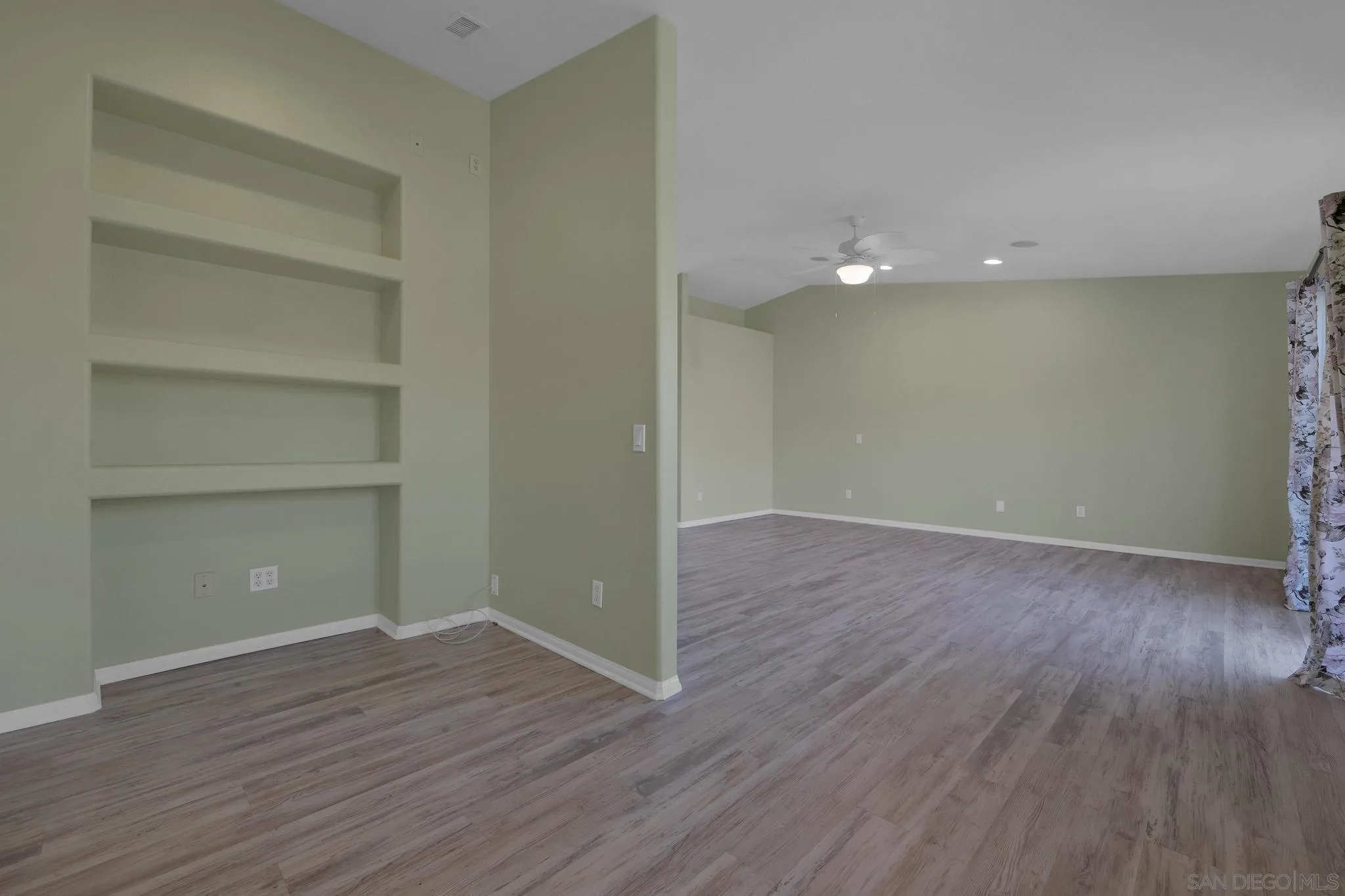 35140 Stirrup Road Temecula, CA 92592 - Photo 29 of 75 a view of a room with wooden floor and closet