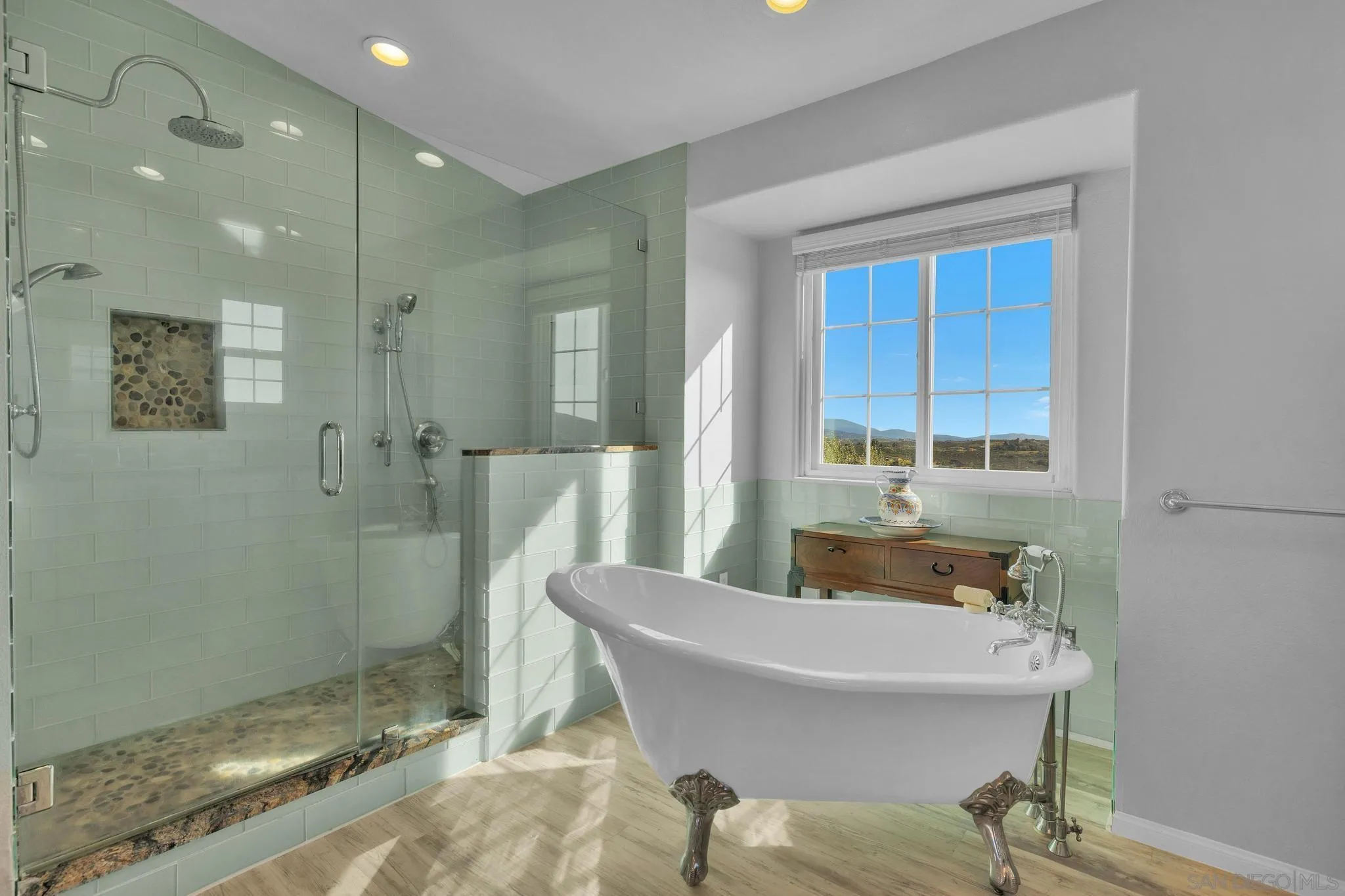 35140 Stirrup Road Temecula, CA 92592 - Photo 34 of 75 a bathroom with a sink and a mirror