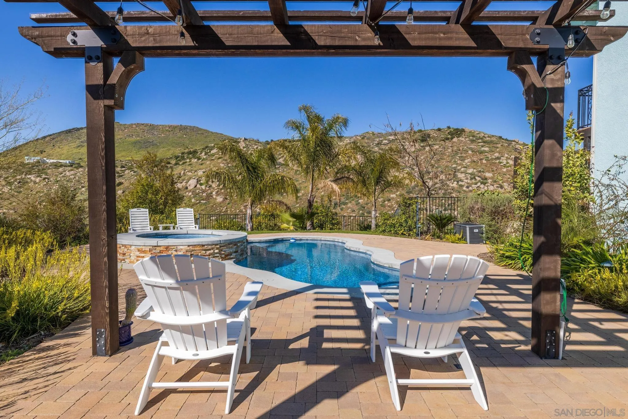 35140 Stirrup Road Temecula, CA 92592 - Photo 46 of 75 a view of a chairs and table in the patio