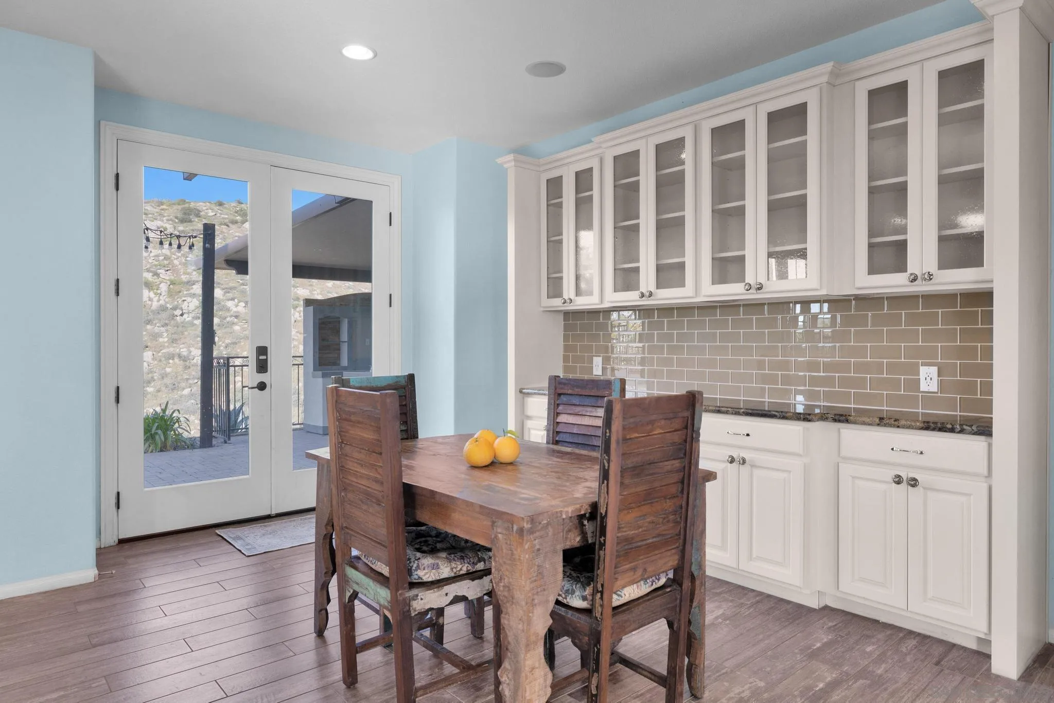 35140 Stirrup Road Temecula, CA 92592 - Photo 8 of 75 a view of a dining room with furniture and wooden floor