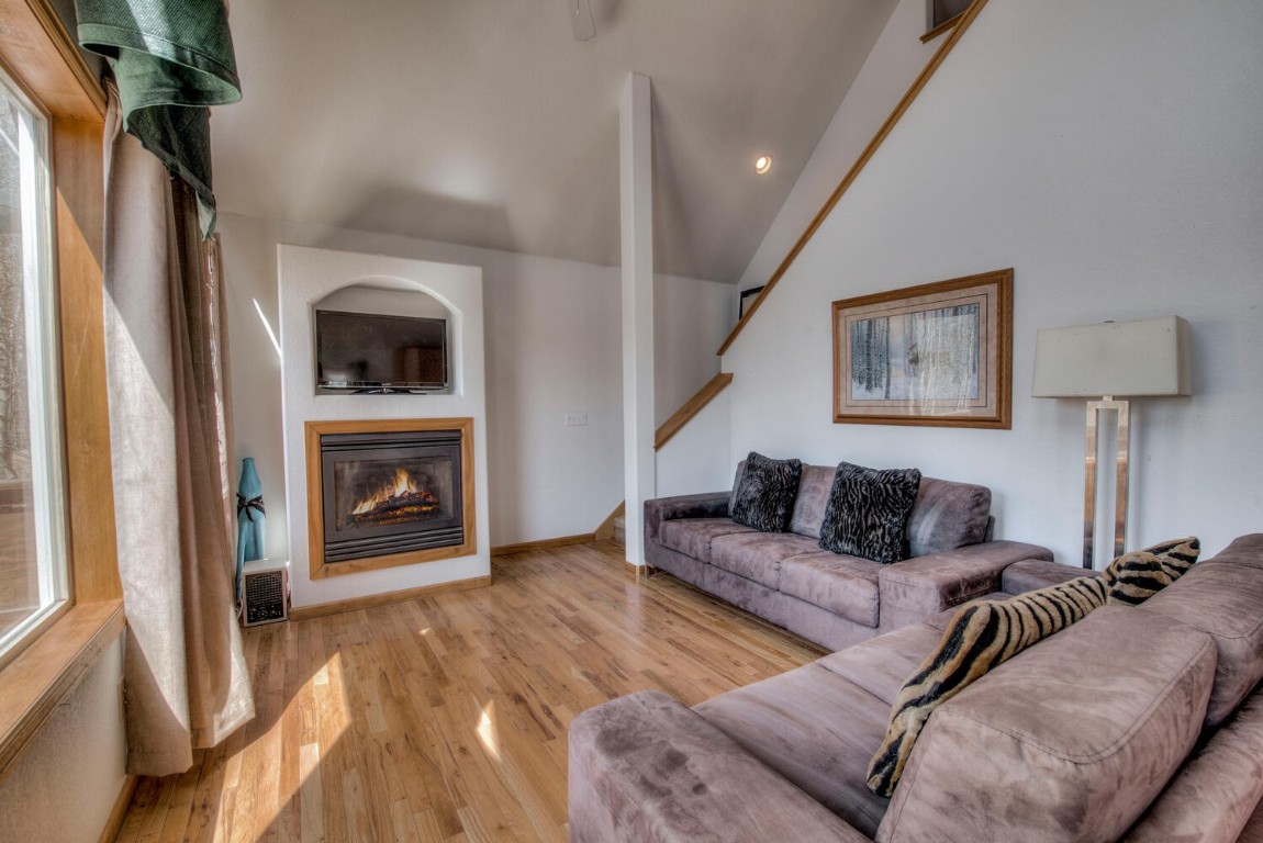 7693 Remington Road Como, CO 80432 - Photo 8 of 29 a living room with furniture and a fireplace