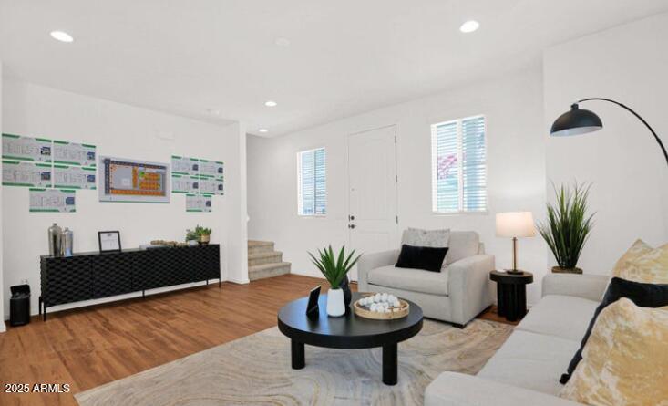 16875 North 12th Street, Unit 1 Phoenix, AZ 85022 - Photo 7 of 9 a living room with furniture and a potted plant