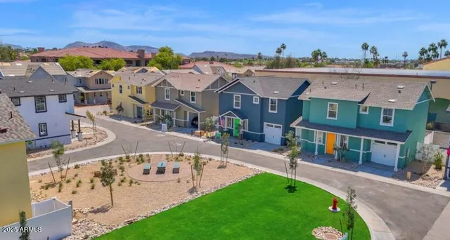 an aerial view of a house with a garden