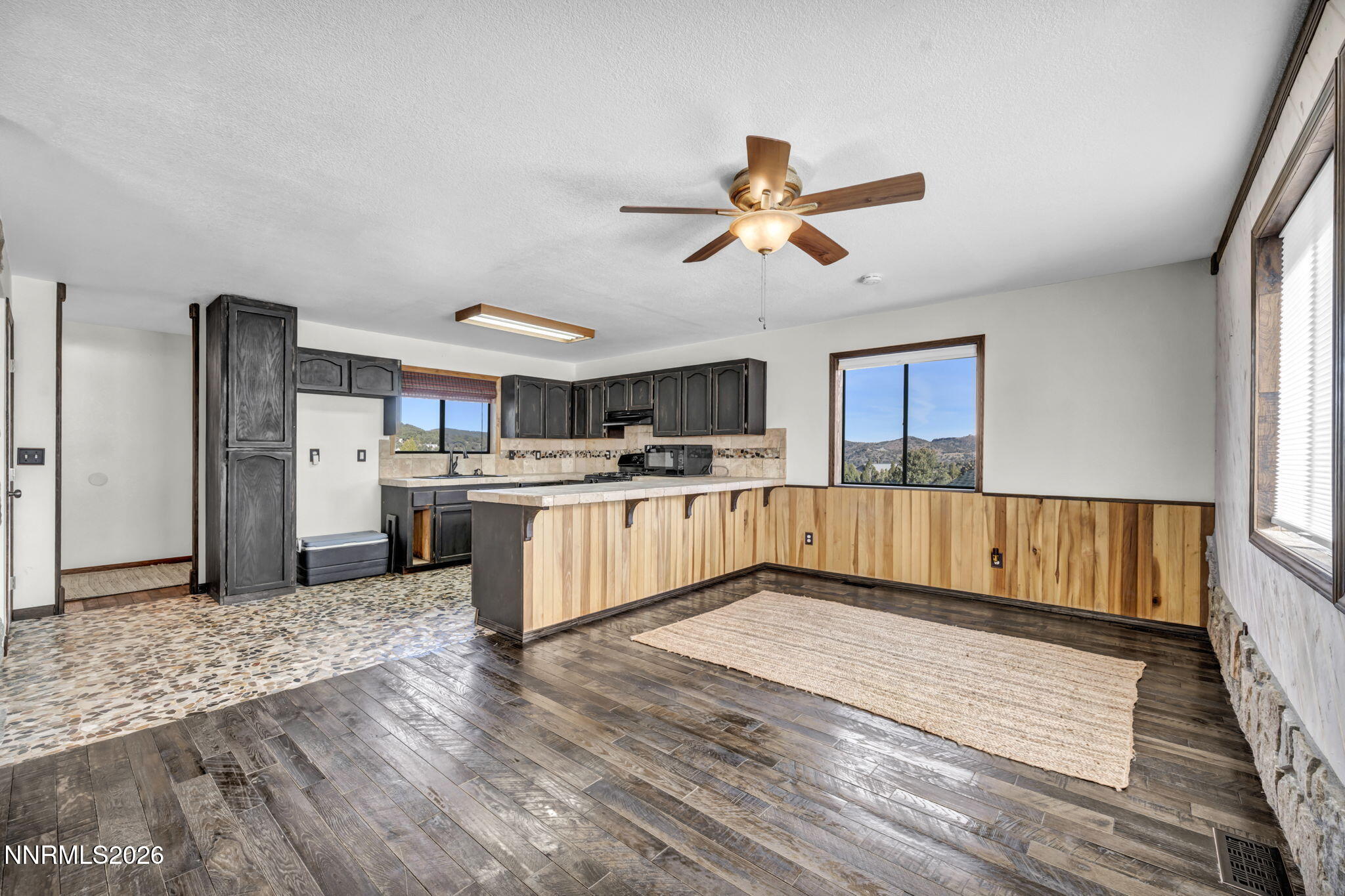 1835 Lousetown Road Reno, NV 89521 - Photo 28 of 60 a view of kitchen with cabinets and wooden floor