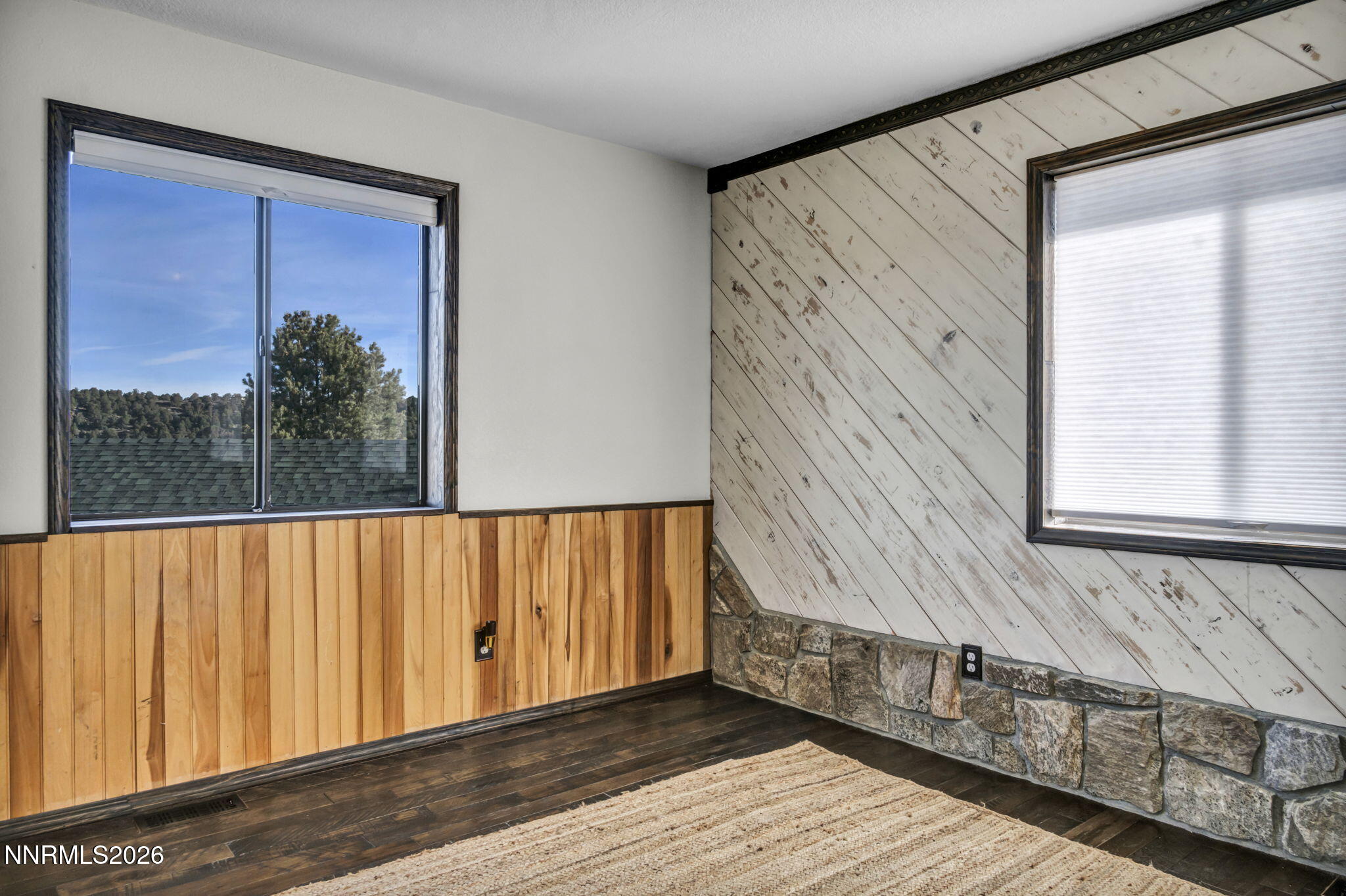 1835 Lousetown Road Reno, NV 89521 - Photo 29 of 60 a view of a balcony with wooden floor and iron stairs