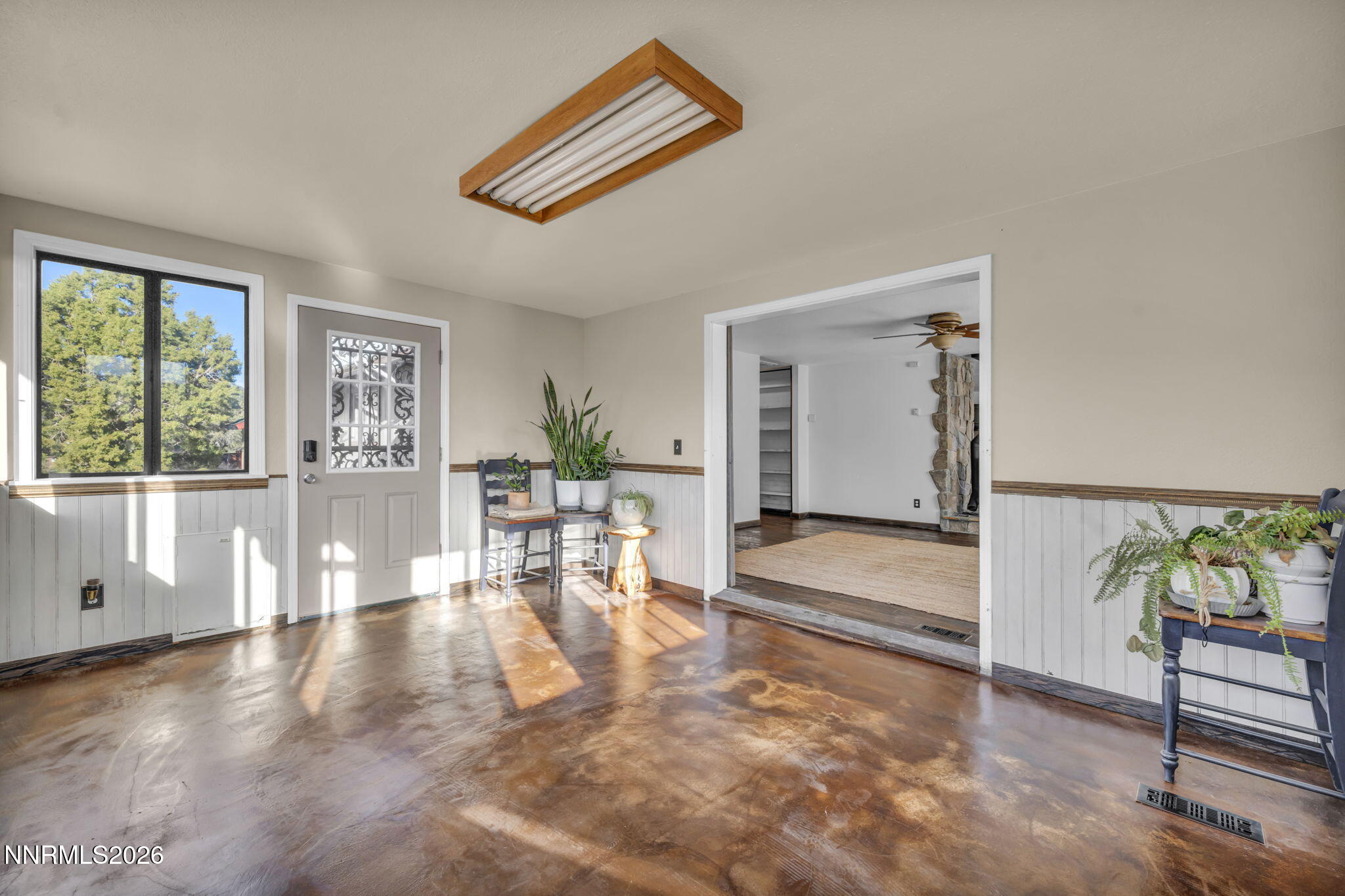 1835 Lousetown Road Reno, NV 89521 - Photo 32 of 60 a view of a room with furniture and wooden floor