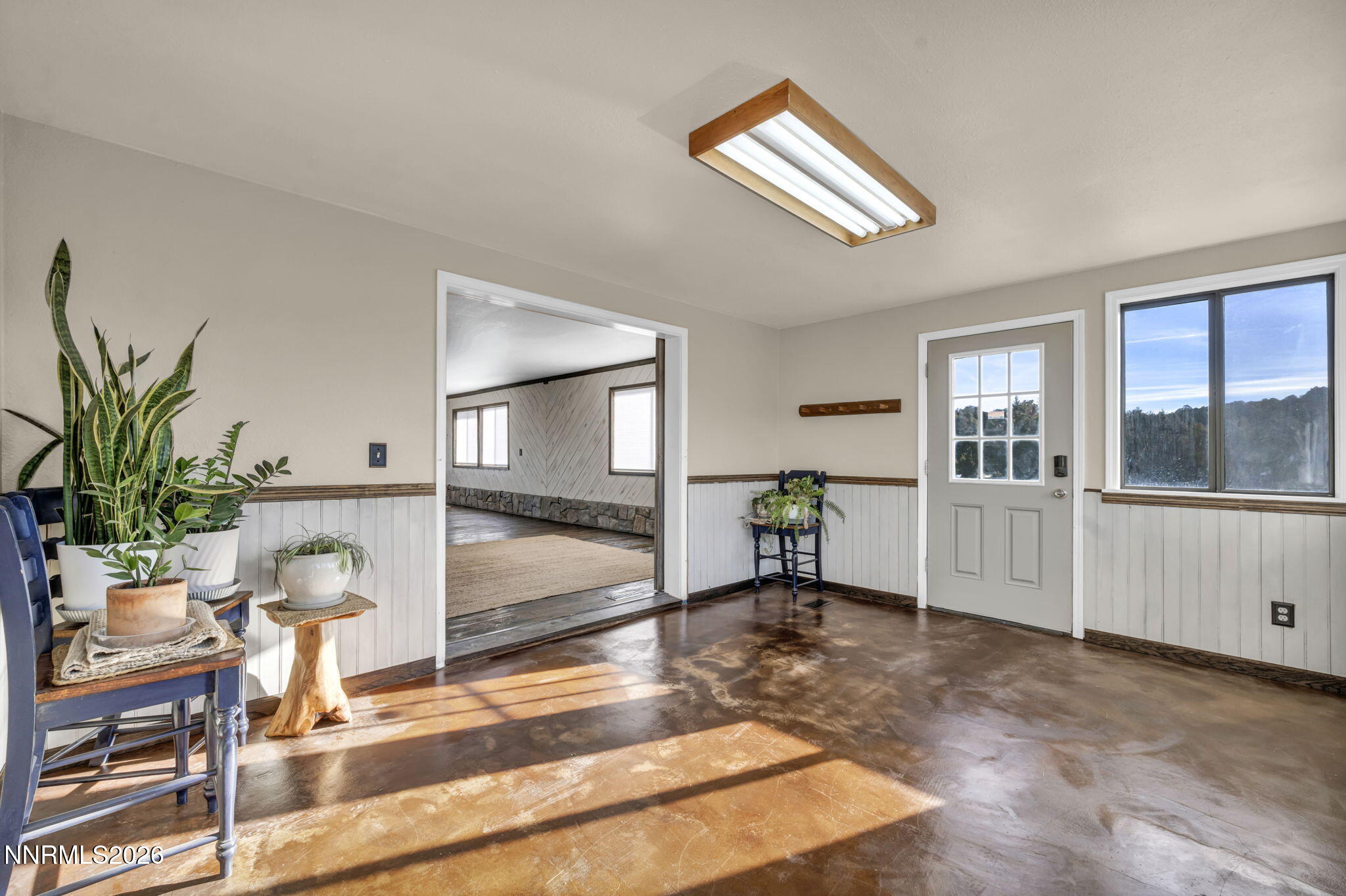 1835 Lousetown Road Reno, NV 89521 - Photo 33 of 60 a view of a livingroom with furniture window and wooden floor