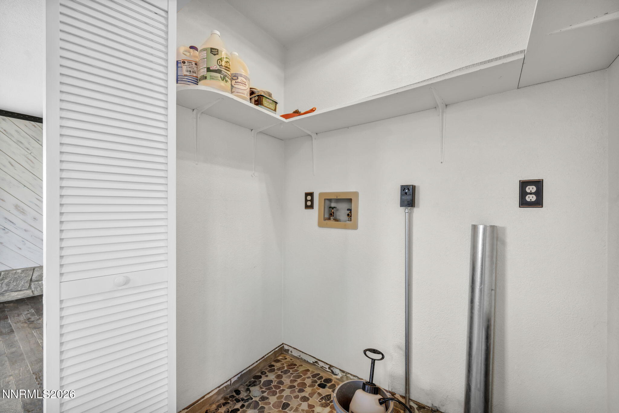 1835 Lousetown Road Reno, NV 89521 - Photo 53 of 60 a bathroom with a sink and a mirror