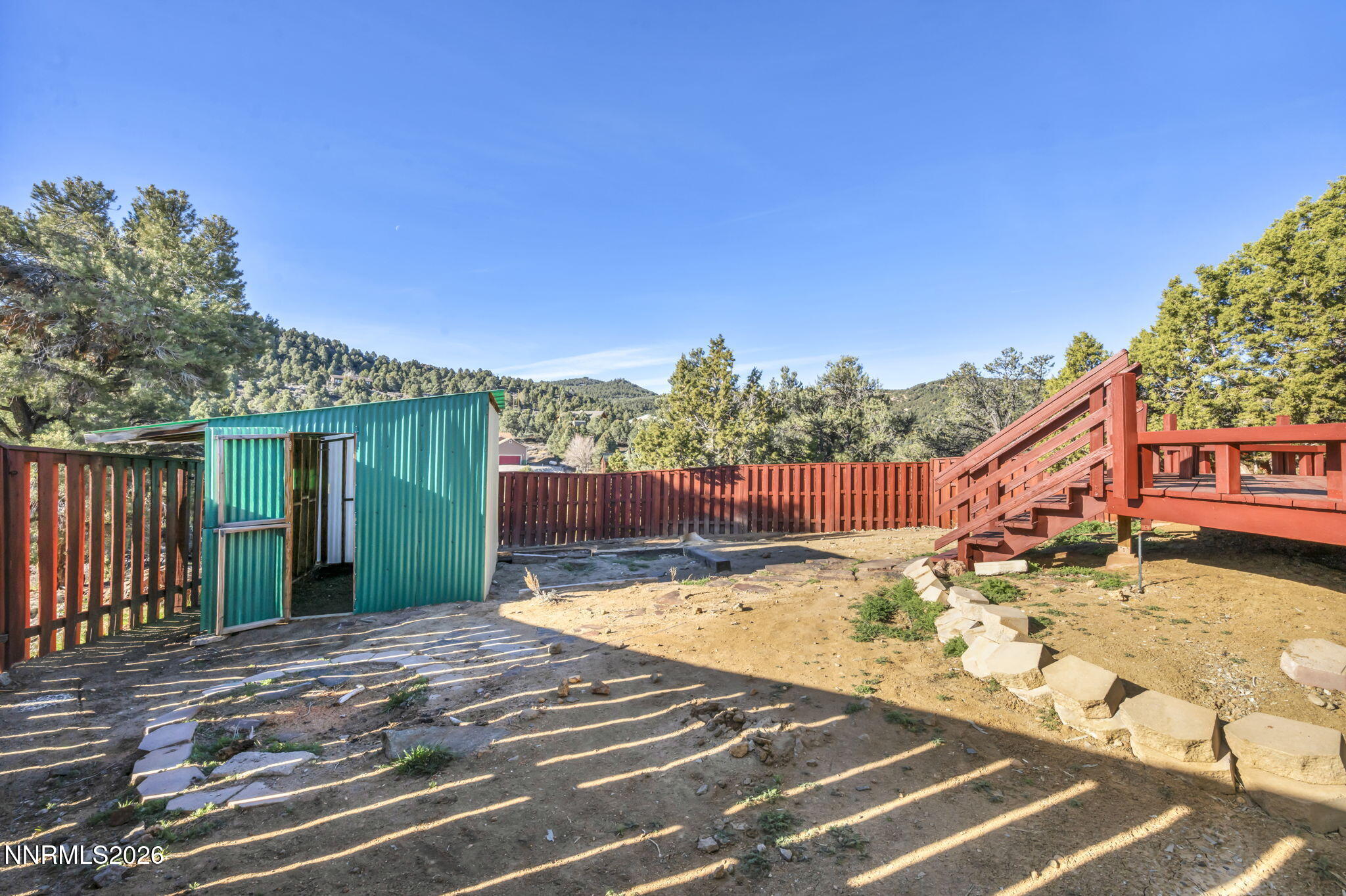 1835 Lousetown Road Reno, NV 89521 - Photo 59 of 60 a view of a backyard with a small pool and wooden fence