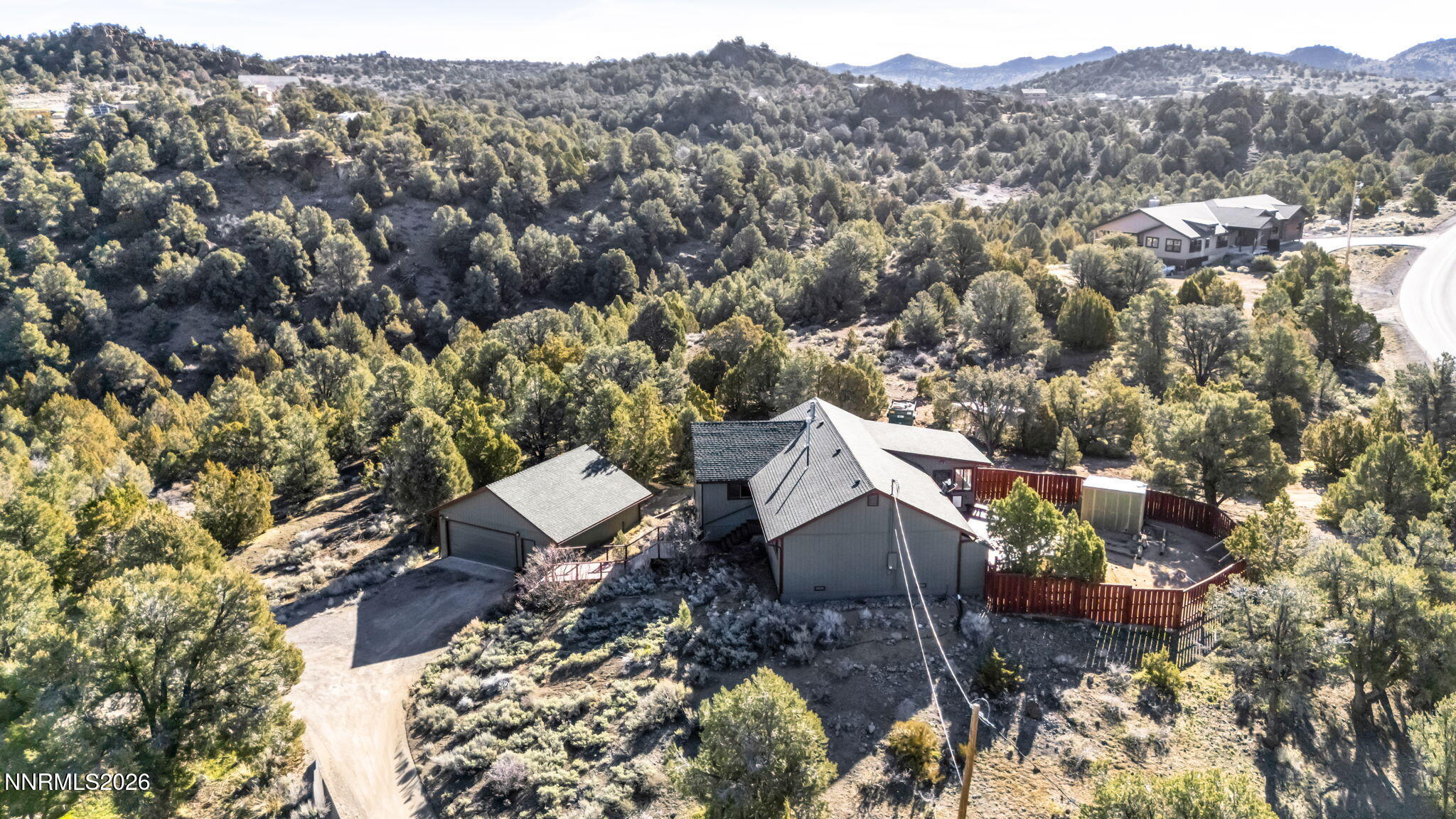 1835 Lousetown Road Reno, NV 89521 - Photo 10 of 60 an aerial view of a house with a mountain