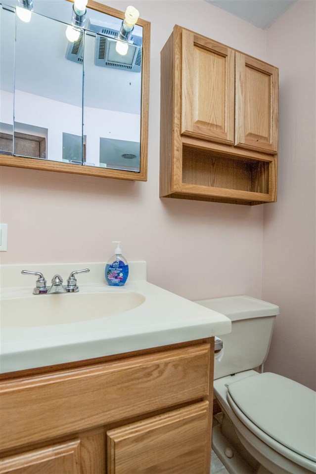 2239 Breckenboro Road Davis, IL 61019 - Photo 15 of 35 a bathroom with a toilet and a sink