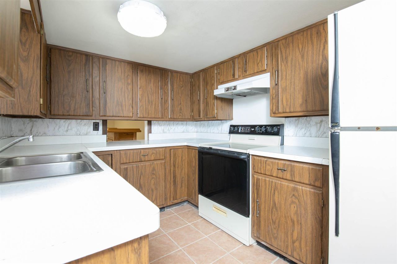 2239 Breckenboro Road Davis, IL 61019 - Photo 25 of 35 a kitchen with granite countertop a sink stainless steel appliances and cabinets