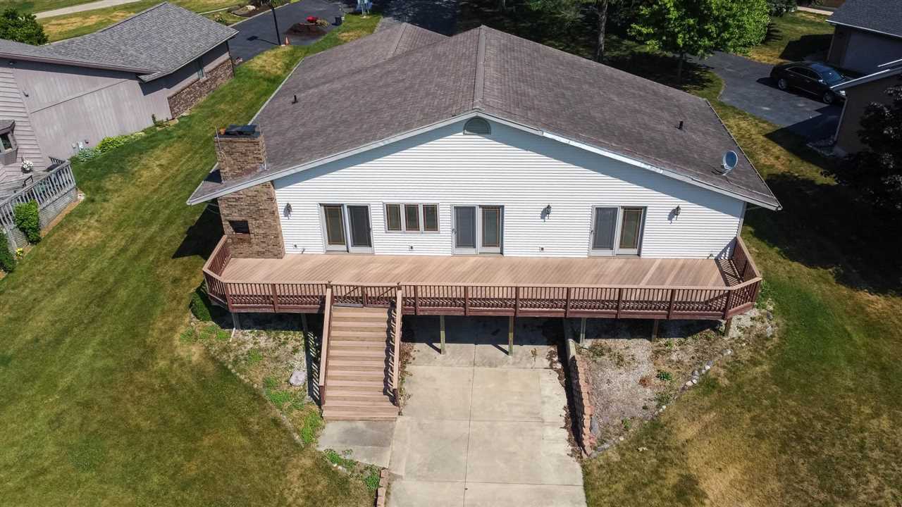 2239 Breckenboro Road Davis, IL 61019 - Photo 27 of 35 a aerial view of a house with a yard and balcony