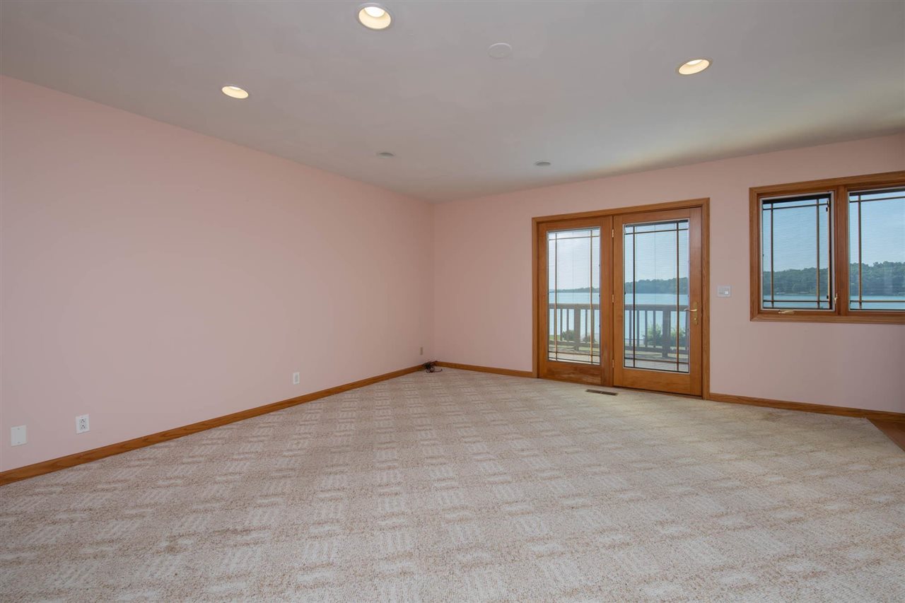 2239 Breckenboro Road Davis, IL 61019 - Photo 7 of 35 a view of an empty room with a window