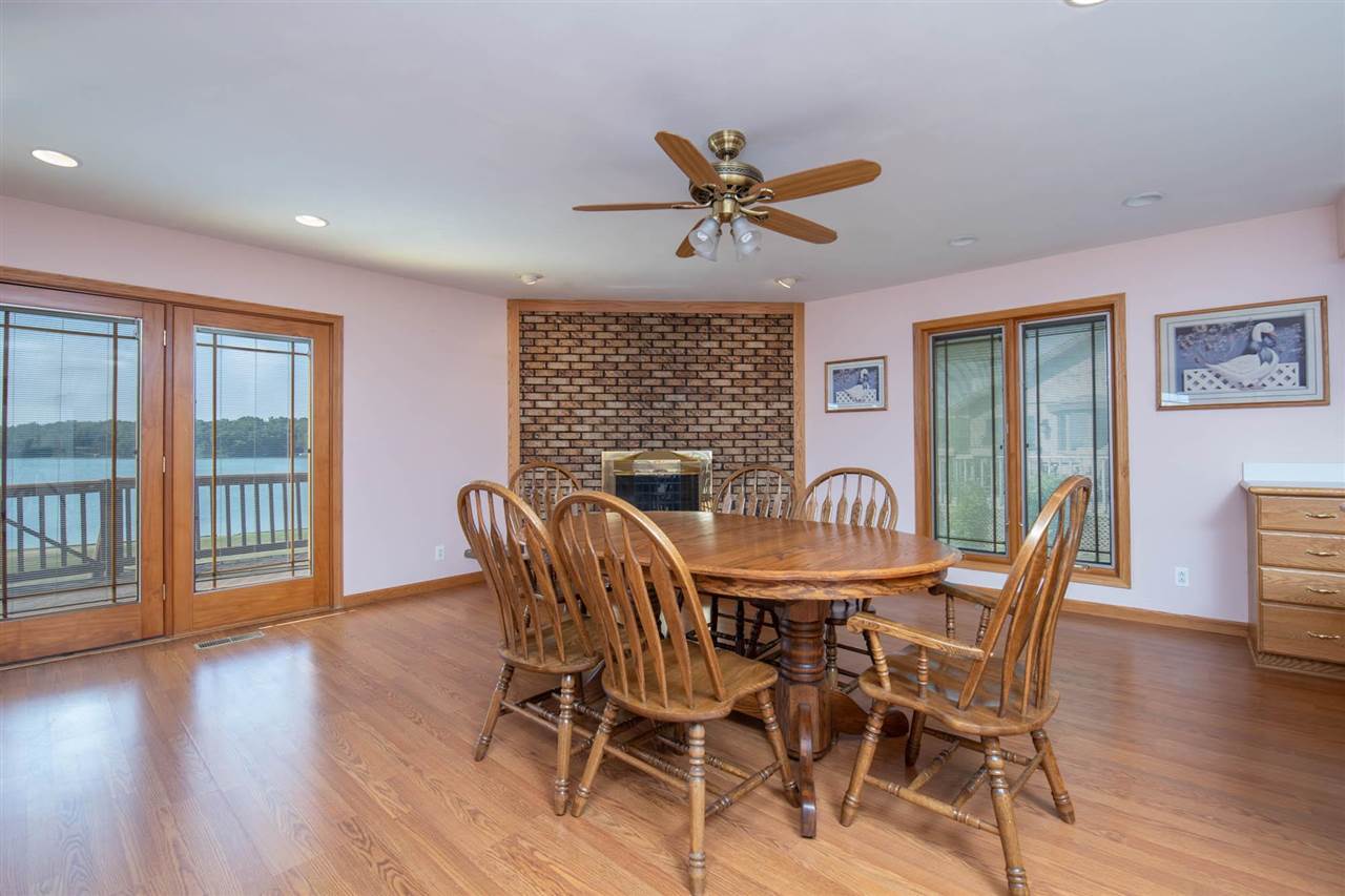 2239 Breckenboro Road Davis, IL 61019 - Photo 8 of 35 a view of a dining room with furniture window and wooden floor