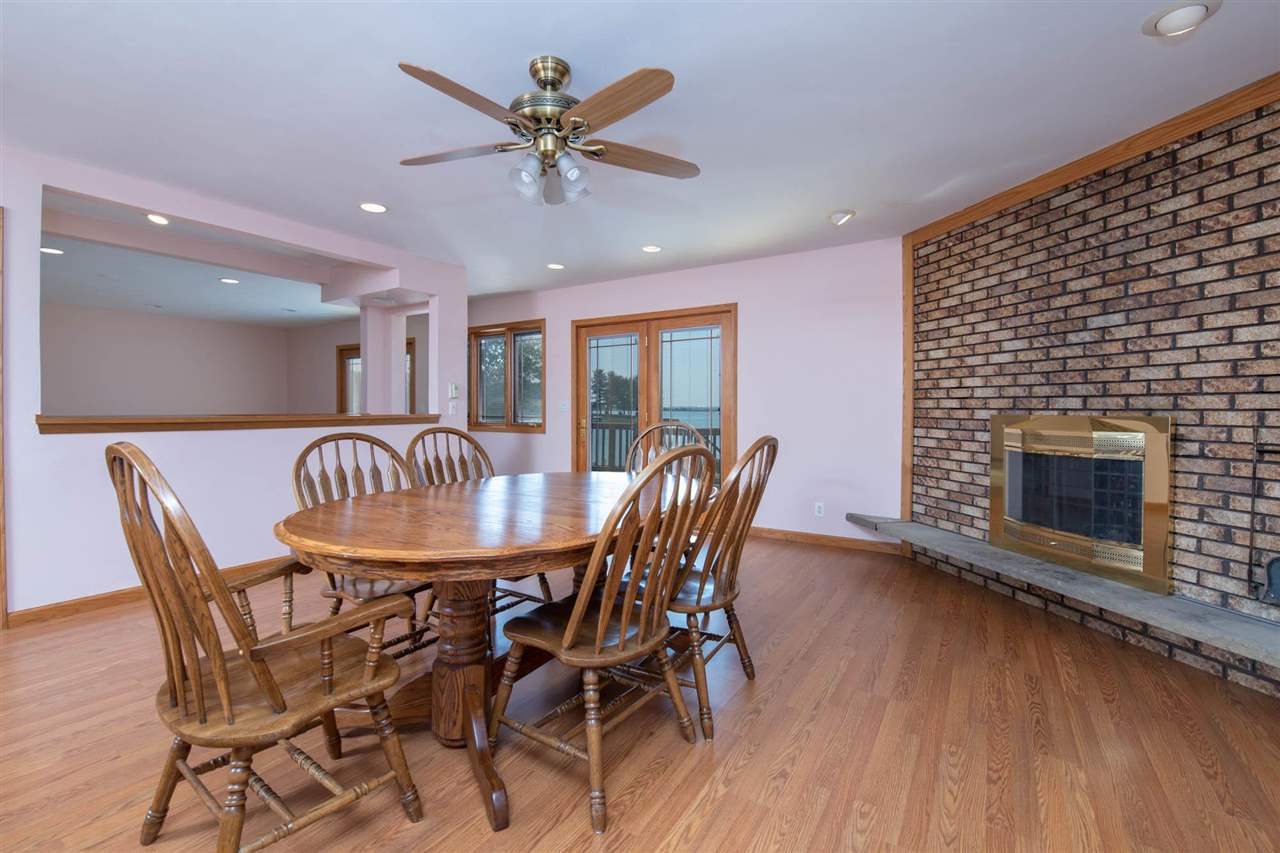2239 Breckenboro Road Davis, IL 61019 - Photo 9 of 35 a view of a dining room with furniture window and wooden floor