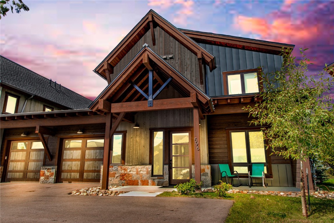 596 Fly Line Drive Silverthorne, CO 80498 - Photo 1 of 32 a front view of a house with a yard