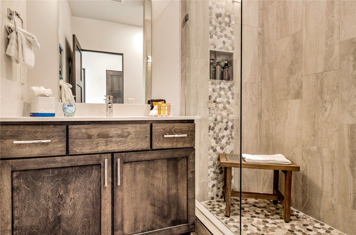 596 Fly Line Drive Silverthorne, CO 80498 - Photo 15 of 32 a bathroom with a sink a toilet and shower